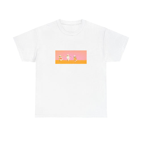 White Dancers tee — three figures against a pink and orange gradient, printed on the chest of a unisex cotton t-shirt.